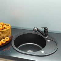 Granit Einbauspüle mit Abtropffläche oval 58x47cm